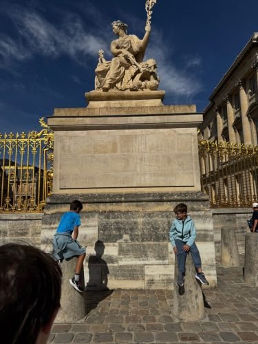 Versailles - their favorite part... hopping on the posts